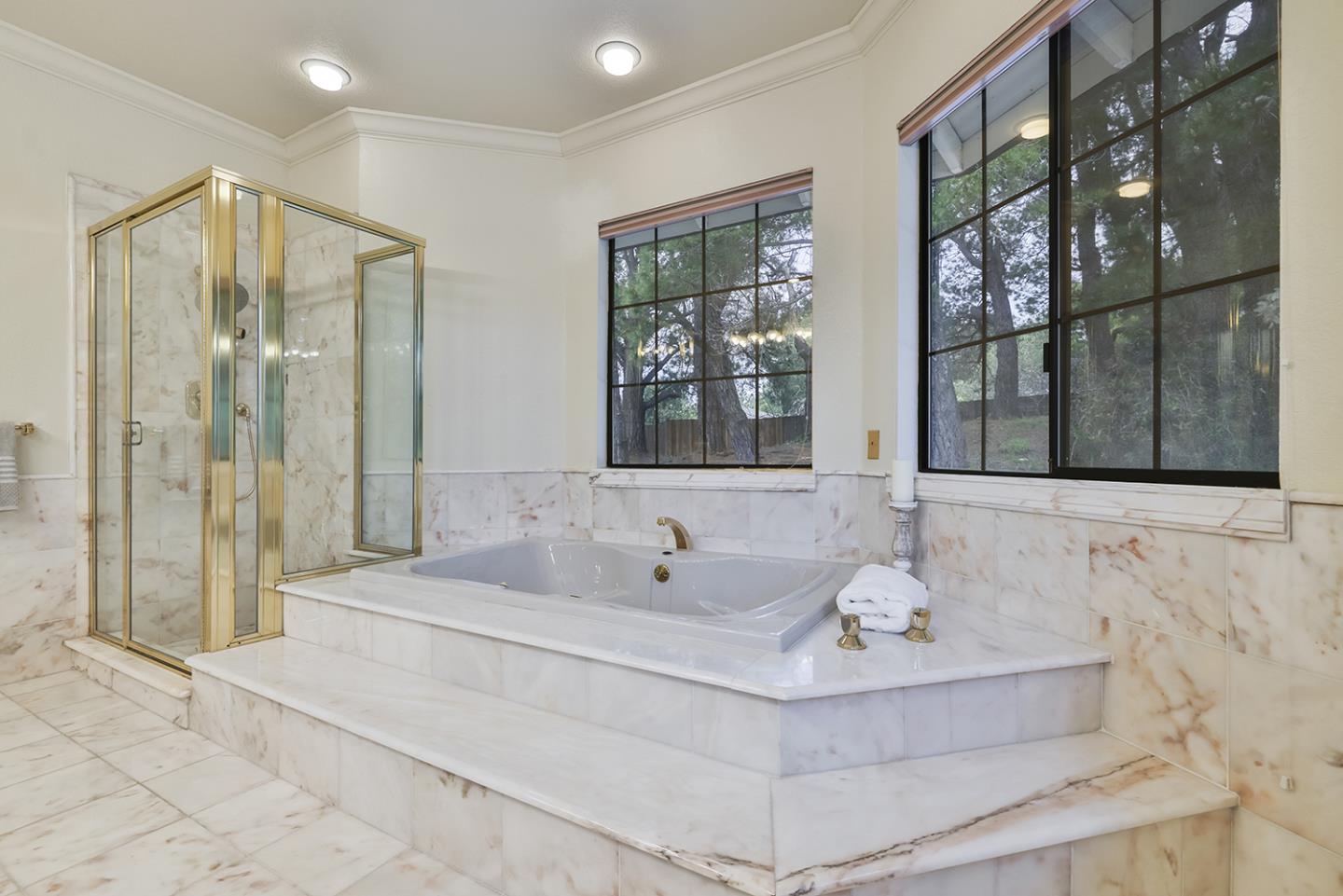 20 Tea Tree Court Hillsborough, CA 94010 - Photo 67 of 100 a bathroom with a sink and a mirror