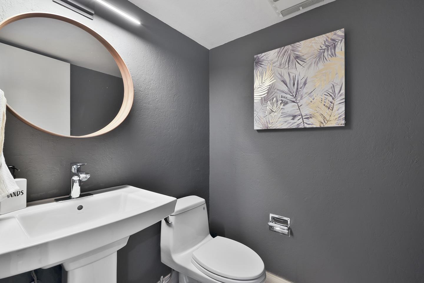 20 Tea Tree Court Hillsborough, CA 94010 - Photo 73 of 100 a bathroom with a toilet and a sink