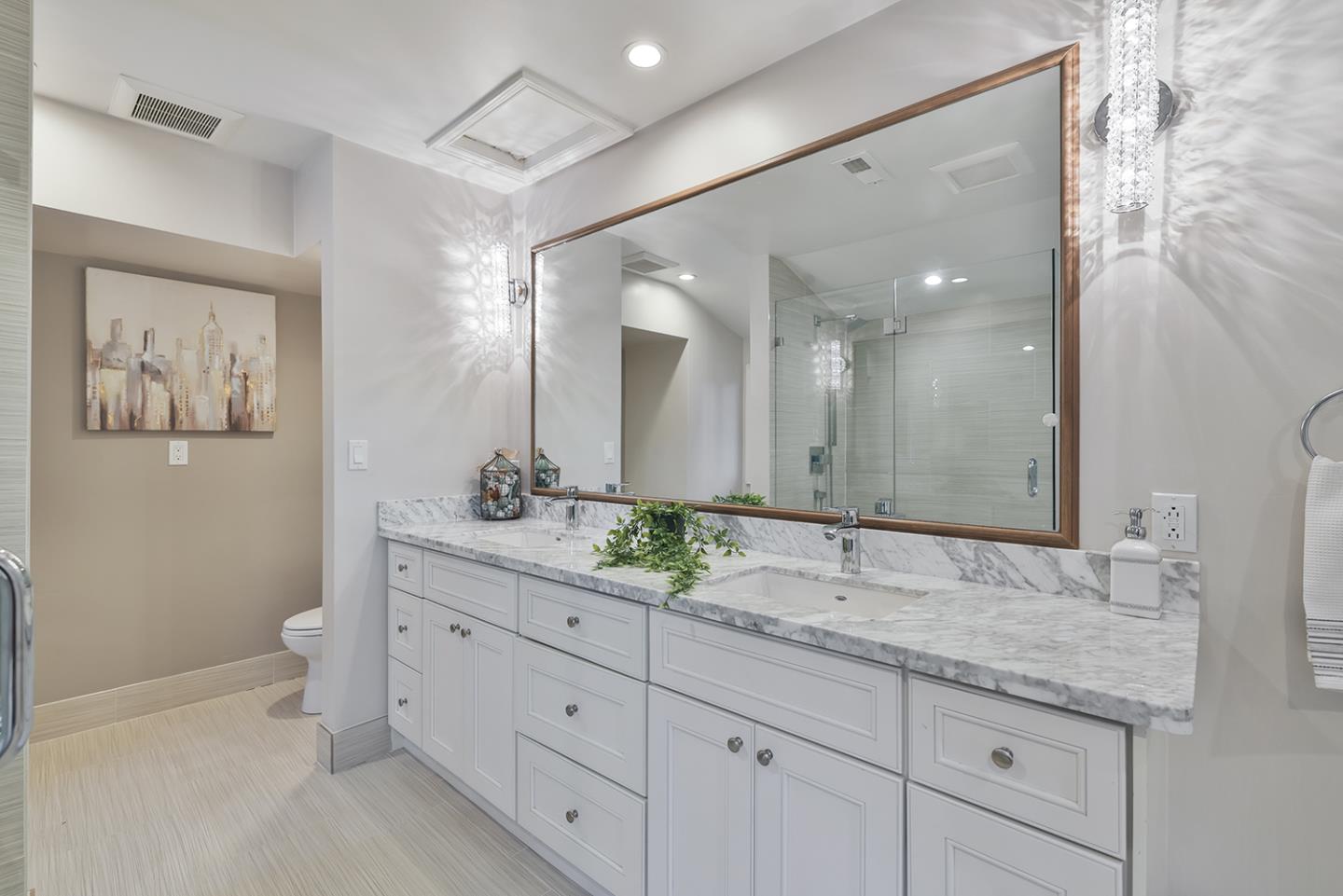20 Tea Tree Court Hillsborough, CA 94010 - Photo 86 of 100 a bathroom with a granite countertop sink mirror and double