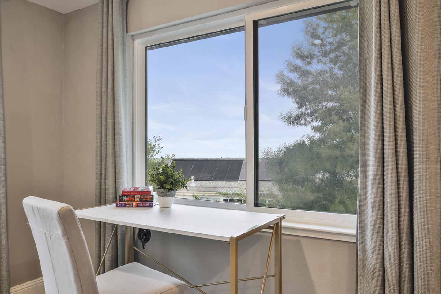 20 Tea Tree Court Hillsborough, CA 94010 - Photo 95 of 100 a view of a room that has a window and a table in it