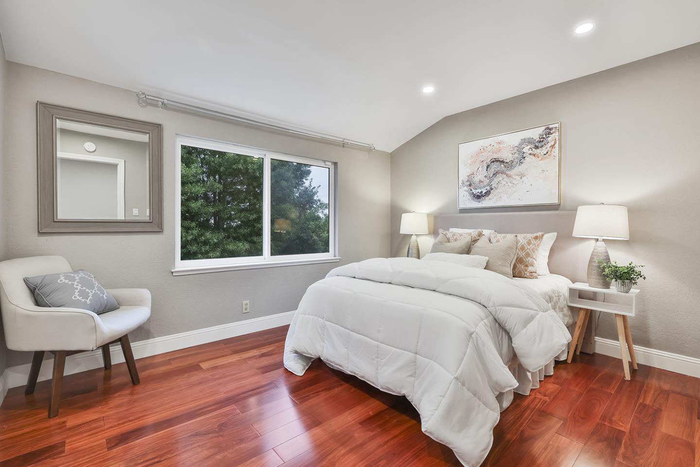 20 Tea Tree Court Hillsborough, CA 94010 - Photo 99 of 100 a bedroom with a bed and wooden floor