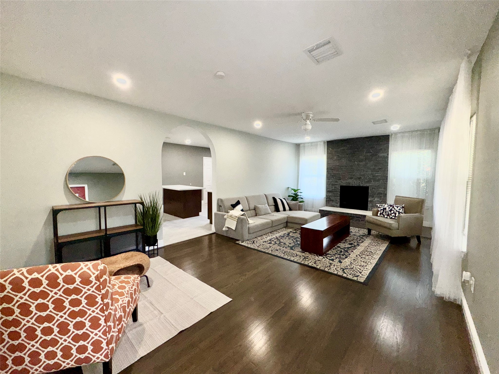 a living room with furniture and a couch