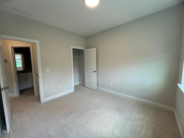 2819 Macbeth Lane Apex, NC 27502 - Photo 41 of 62 an empty room with an entryway