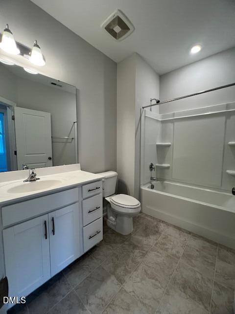 2819 Macbeth Lane Apex, NC 27502 - Photo 44 of 62 a bathroom with a granite countertop toilet a sink and bathtub