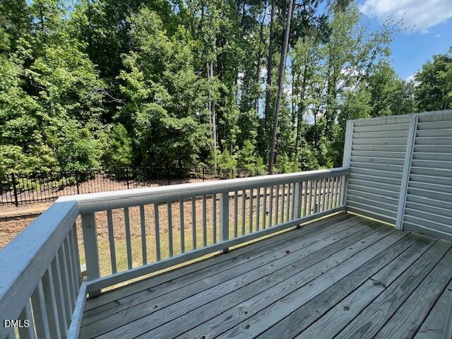 2819 Macbeth Lane Apex, NC 27502 - Photo 46 of 62 a view of balcony with wooden floor