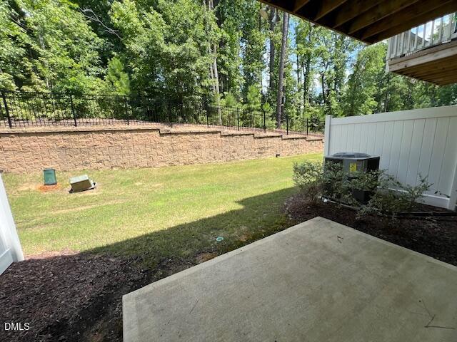 2819 Macbeth Lane Apex, NC 27502 - Photo 60 of 62 a view of a yard with an outdoor space