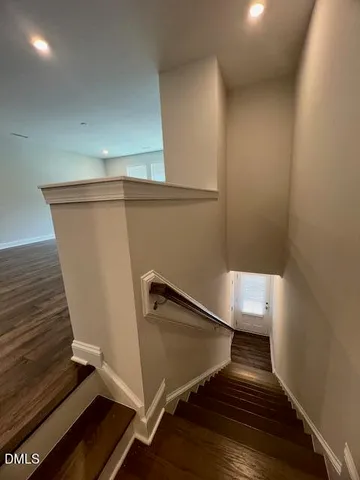 a view of kitchen with kitchen island sink refrigerator and stove
