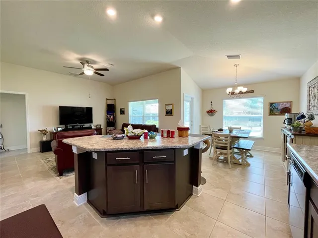a view of a living room and dining room
