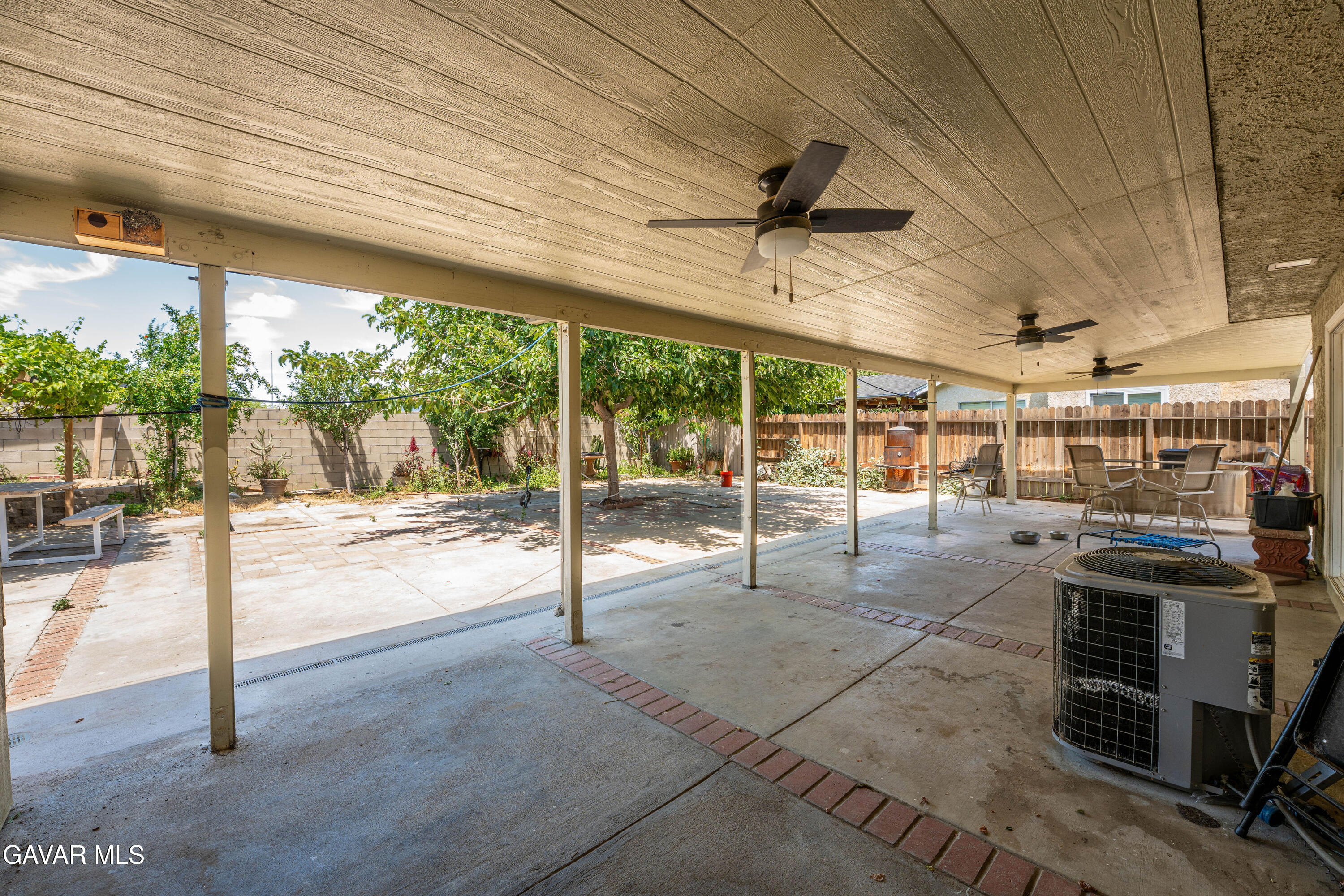 5009 East Ave R 11 Palmdale, CA 93552 - Photo 23 of 23 a view of a hall with wooden floor