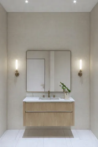 a bathroom with a sink and a mirror