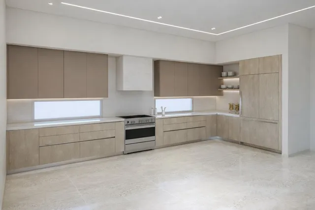 a kitchen with a cabinets and white appliances