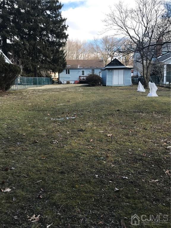 702 Myrtle Road North Brunswick, NJ 08902 - Photo 7 of 9 a view of a yard with a house
