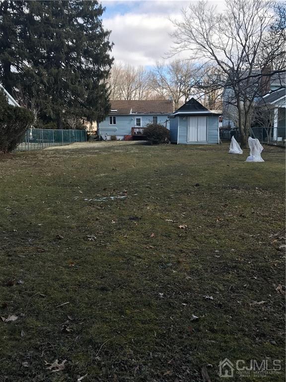702 Myrtle Road North Brunswick, NJ 08902 - Photo 9 of 9 a view of a yard with a house