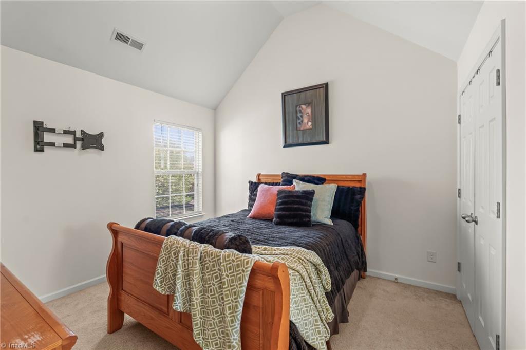 3532 Sagedale Court High Point, NC 27265 - Photo 30 of 41 Cathedral ceilings in the upper level guest bedrooms