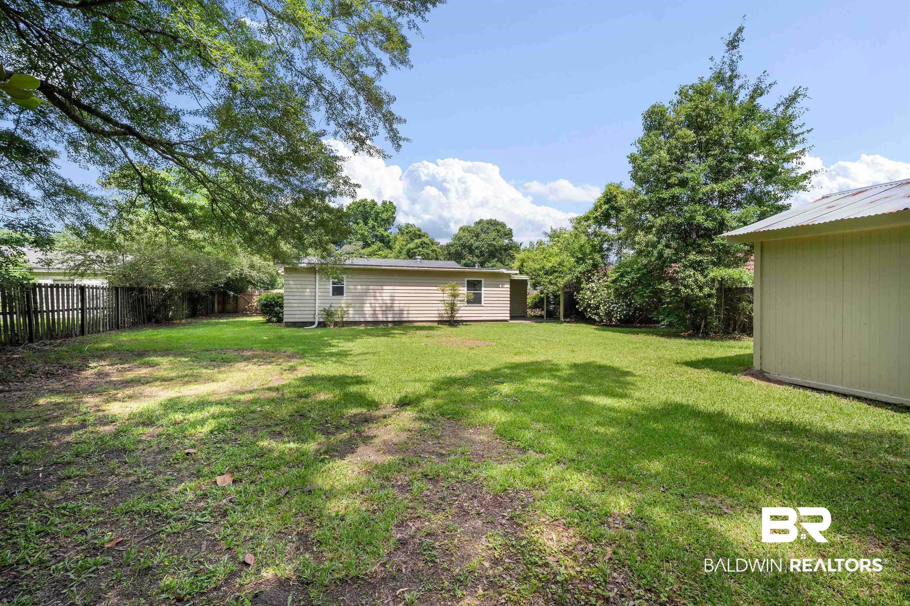 963 Shady Brook Drive Mobile, AL 36606 - Photo 19 of 20 View of yard featuring an outdoor structure