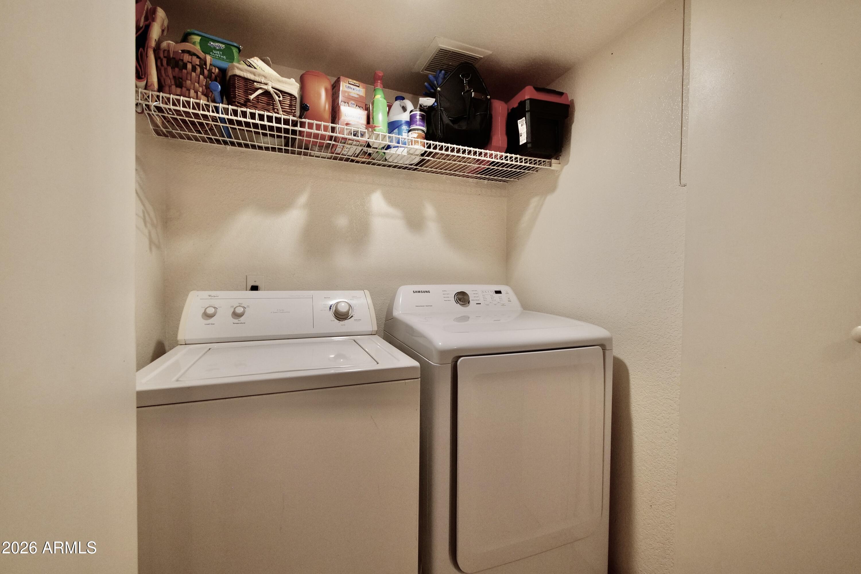 1222 West Baseline Road, Unit 156 Tempe, AZ 85283 - Photo 19 of 27 a utility room with dryer and washer