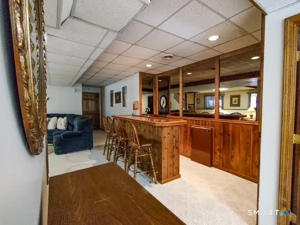a room with a table and chairs
