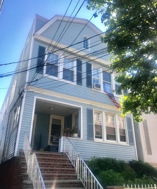 a view of a house with a porch