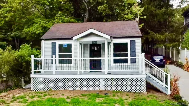 a house view with a garden