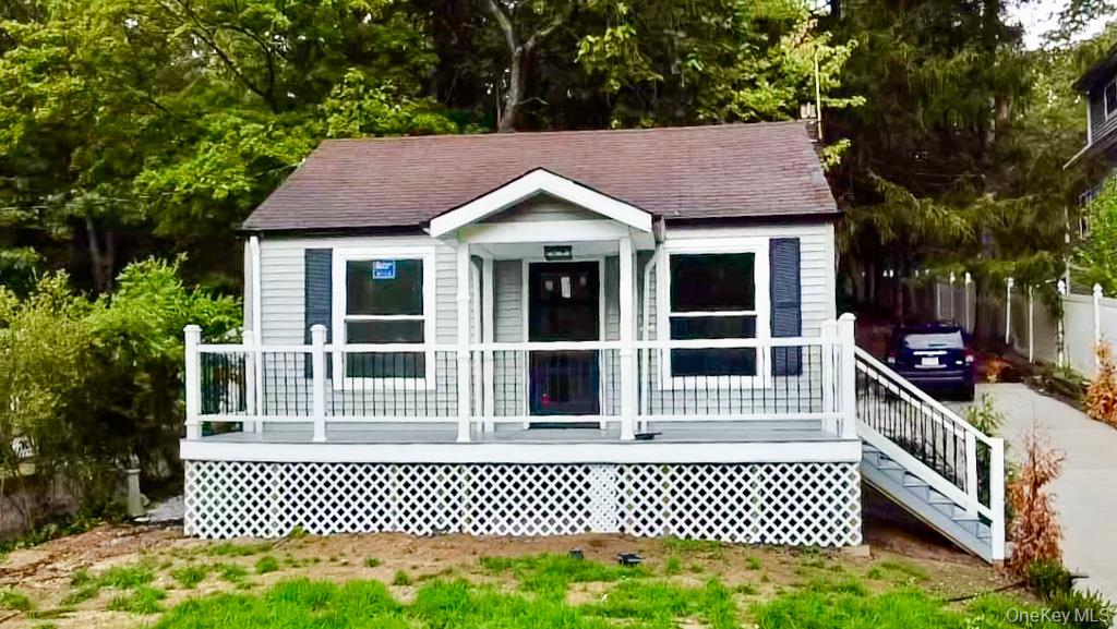 a house view with a garden