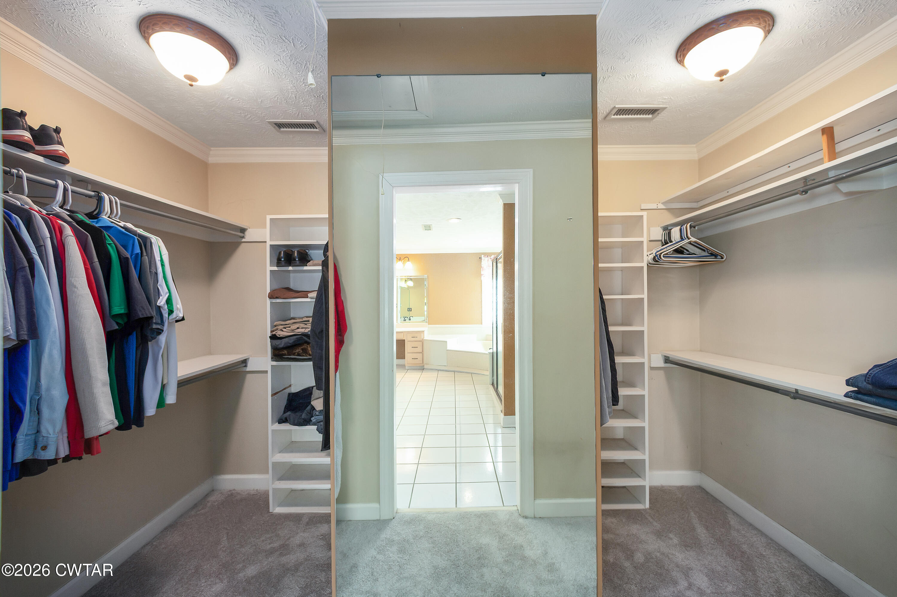 103 April Cove Ripley, TN 38063 - Photo 42 of 50 a view of walk in closet with clothes and shoes