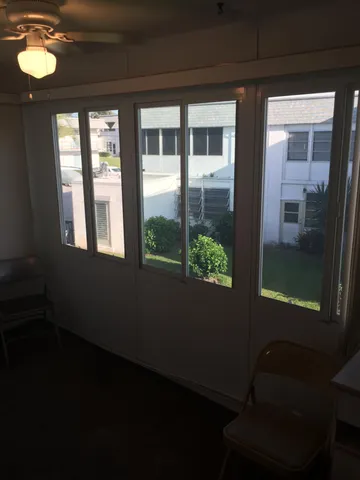 a view of a car parked on the side of the road