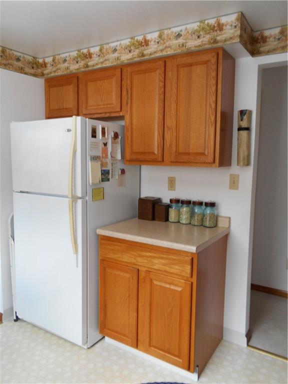 566 Filmore Road Pittsburgh, PA 15221 - Photo 14 of 25 More cabinets on this side of the 10 x 8 kitchen.