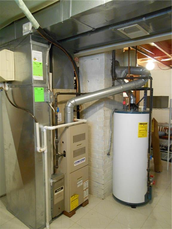 566 Filmore Road Pittsburgh, PA 15221 - Photo 23 of 25 Appliances have been on a regular maintenance schedule. Duct work is newer, installed around 2003. Nice vinyl floor in this basement/laundry area.