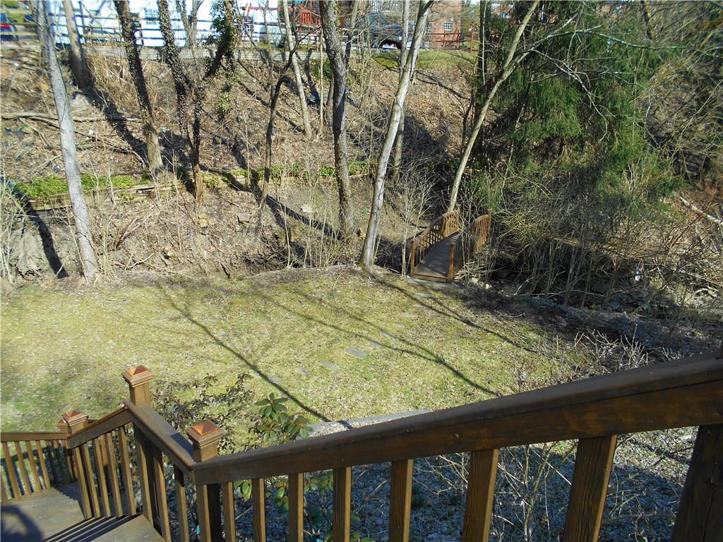 566 Filmore Road Pittsburgh, PA 15221 - Photo 5 of 25 Lower tier is very serene with a small stream.