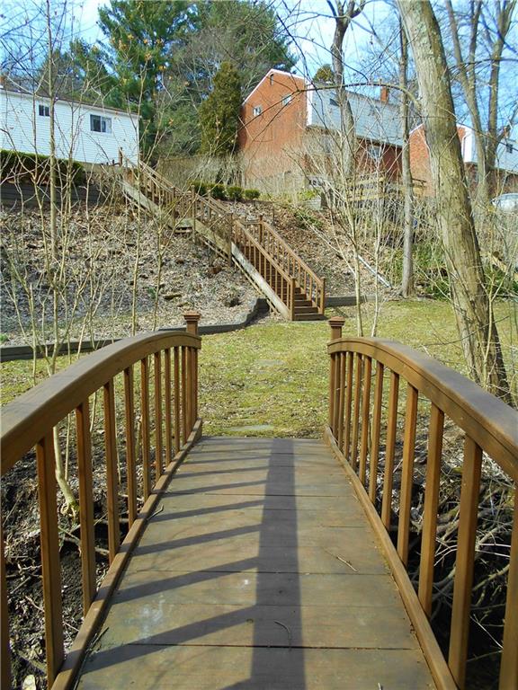 566 Filmore Road Pittsburgh, PA 15221 - Photo 6 of 25 Lower tier has plenty of level land to enjoy a picnic in a woodsy setting.