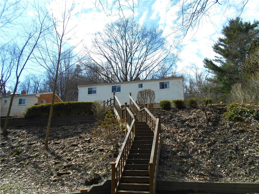 566 Filmore Road Pittsburgh, PA 15221 - Photo 7 of 25 Private and peaceful. Retaining walls made from recycled tires.