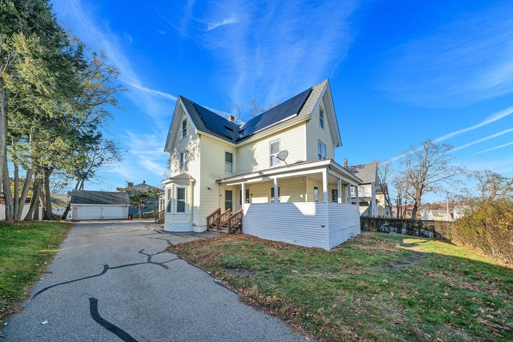 28 Richards Street Worcester, MA 01603 - Photo 2 of 42 a view of a house with a yard