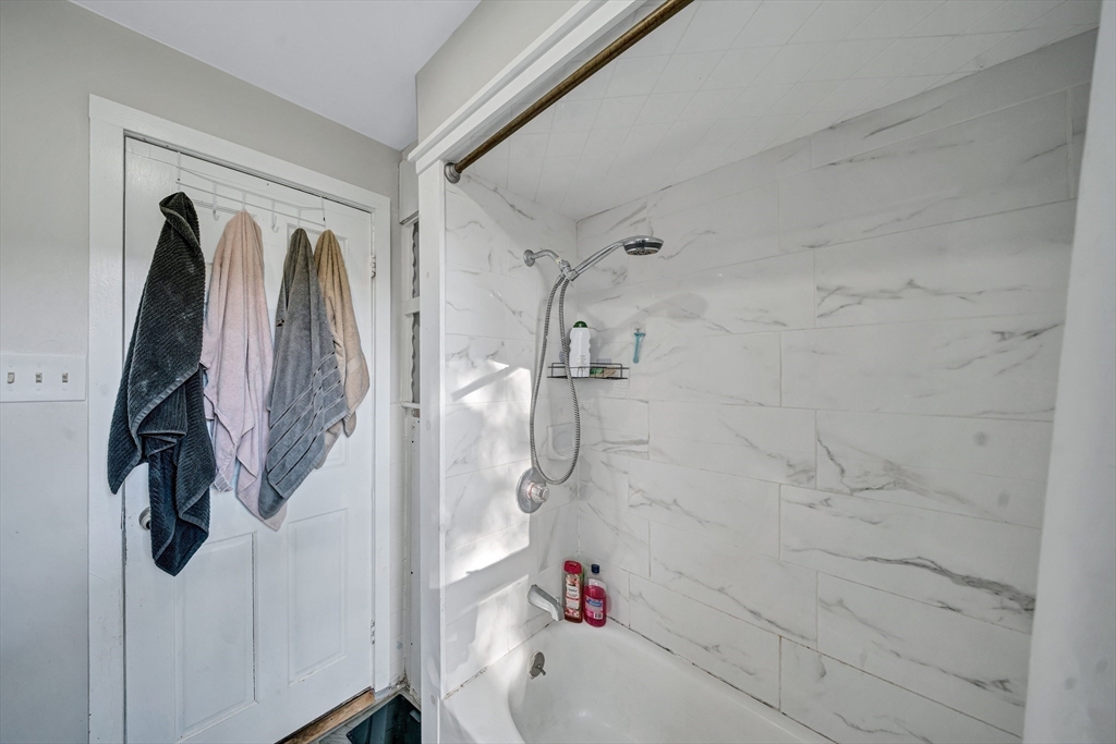 28 Richards Street Worcester, MA 01603 - Photo 24 of 42 a bathroom with a shower