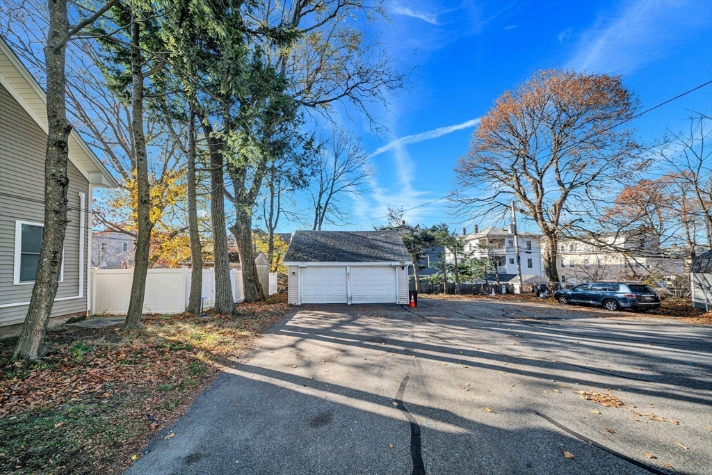 28 Richards Street Worcester, MA 01603 - Photo 6 of 42 a view of a house with a yard