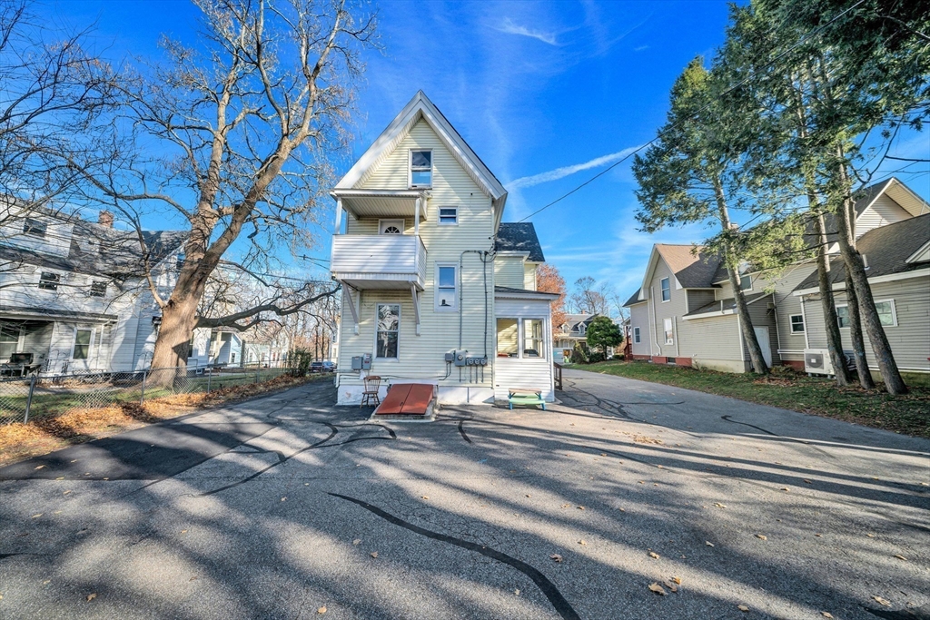 28 Richards Street Worcester, MA 01603 - Photo 7 of 42 a view of a street with houses on the road