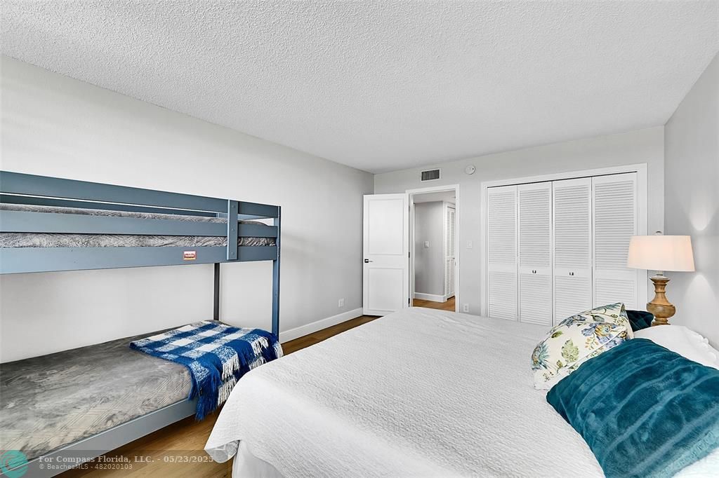 4020 West Palm Aire Drive, Unit 503 Pompano Beach, FL 33069 - Photo 19 of 53 a bedroom with bed and a window