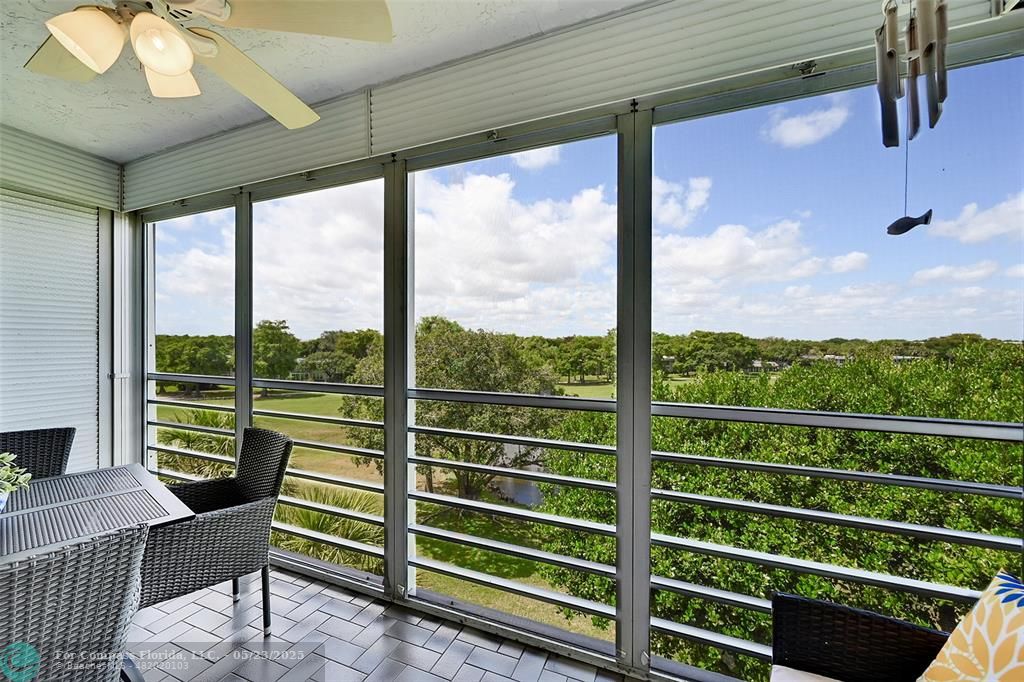 4020 West Palm Aire Drive, Unit 503 Pompano Beach, FL 33069 - Photo 31 of 53 a view of a city from a balcony