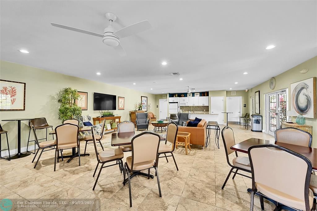 4020 West Palm Aire Drive, Unit 503 Pompano Beach, FL 33069 - Photo 39 of 53 a view of a dining room with furniture