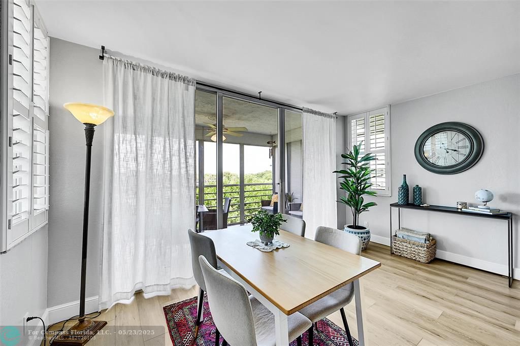 4020 West Palm Aire Drive, Unit 503 Pompano Beach, FL 33069 - Photo 10 of 53 a living room with furniture and a large window