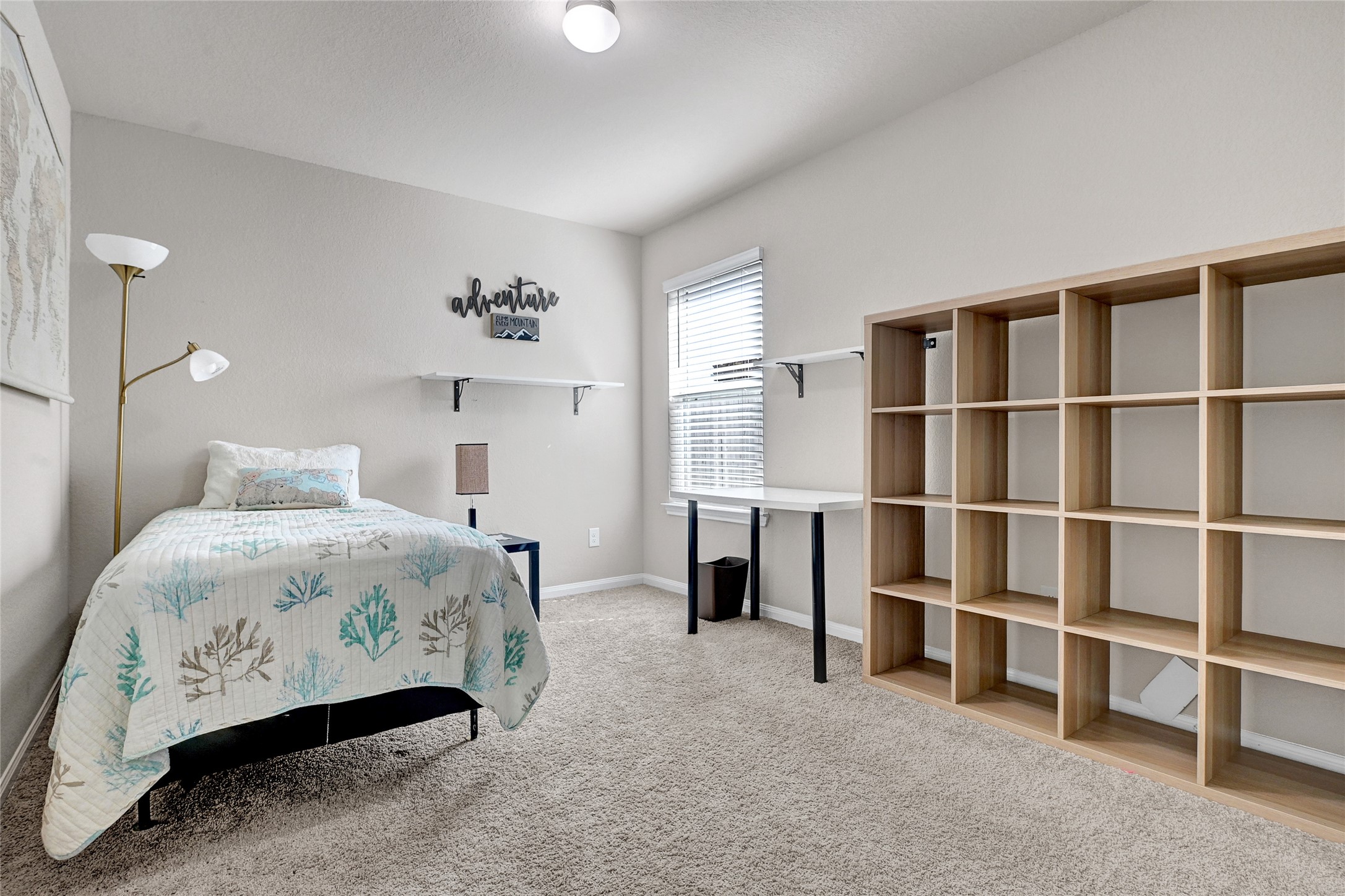 1329 Mount Blanc Path Conroe, TX 77301 - Photo 20 of 23 a bedroom with a bed and a window