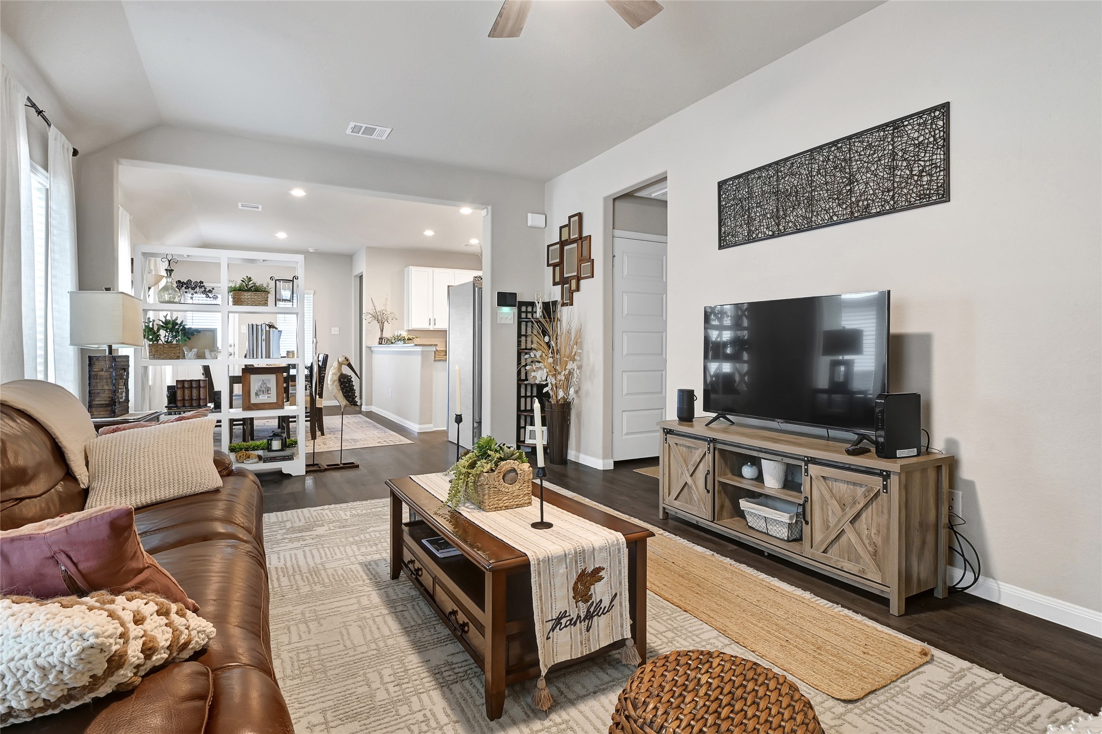 1329 Mount Blanc Path Conroe, TX 77301 - Photo 5 of 23 a living room with furniture and a flat screen tv