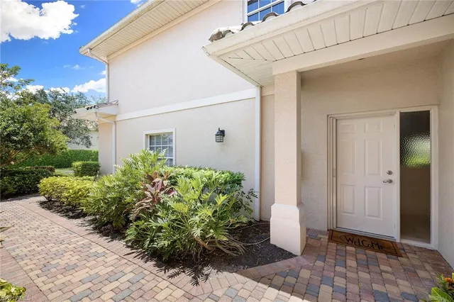 a view of a entryway with flower pots