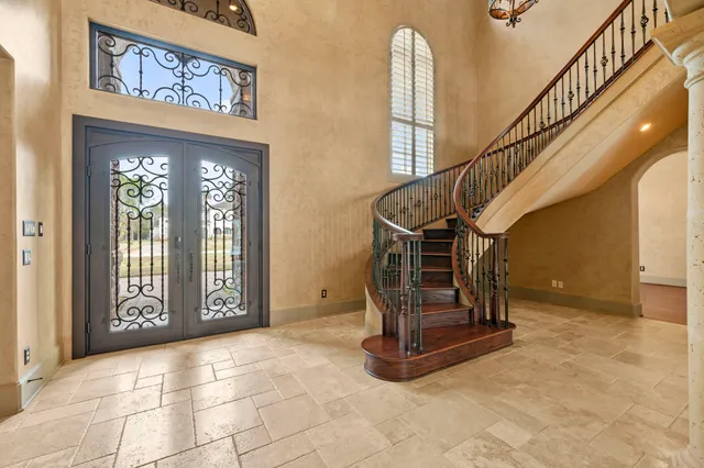 a view of an entryway with a door