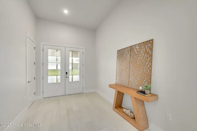 an empty room with windows