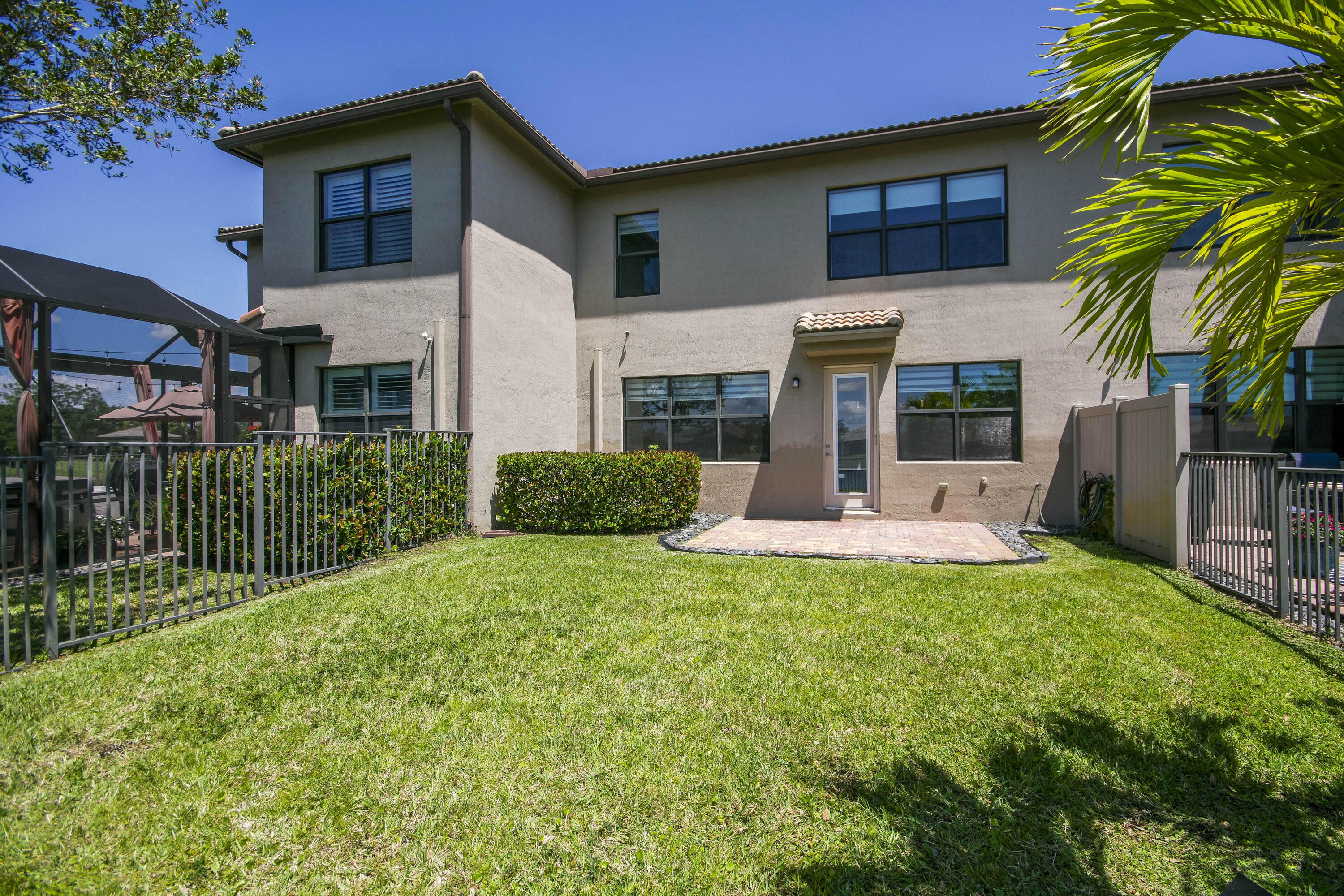 8301 Rearing Lane Lake Worth, FL 33467 - Photo 5 of 33 a view of a house with backyard and sitting area