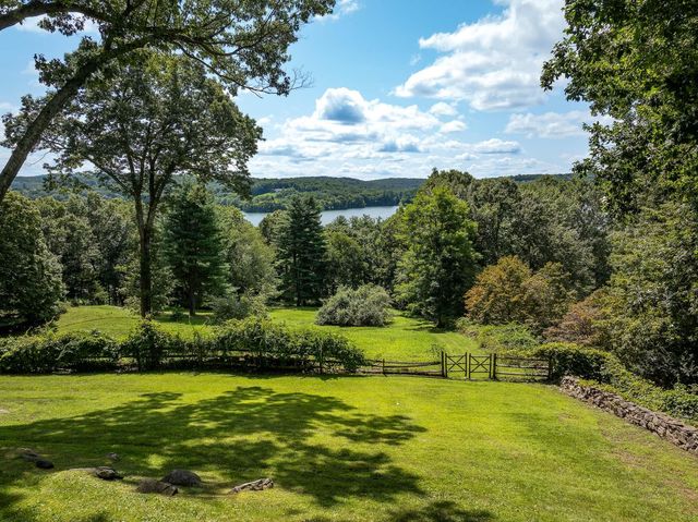 a view of a grassy area with an trees
