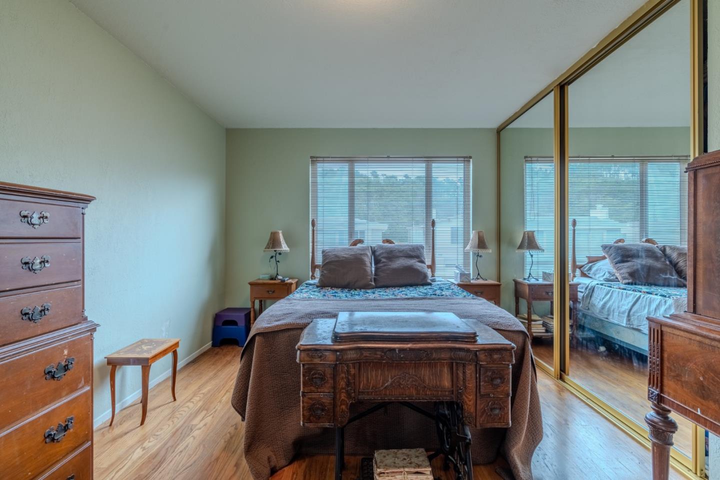 226 Crestmoor Circle Pacifica, CA 94044 - Photo 13 of 23 a dining room with furniture and wooden floor