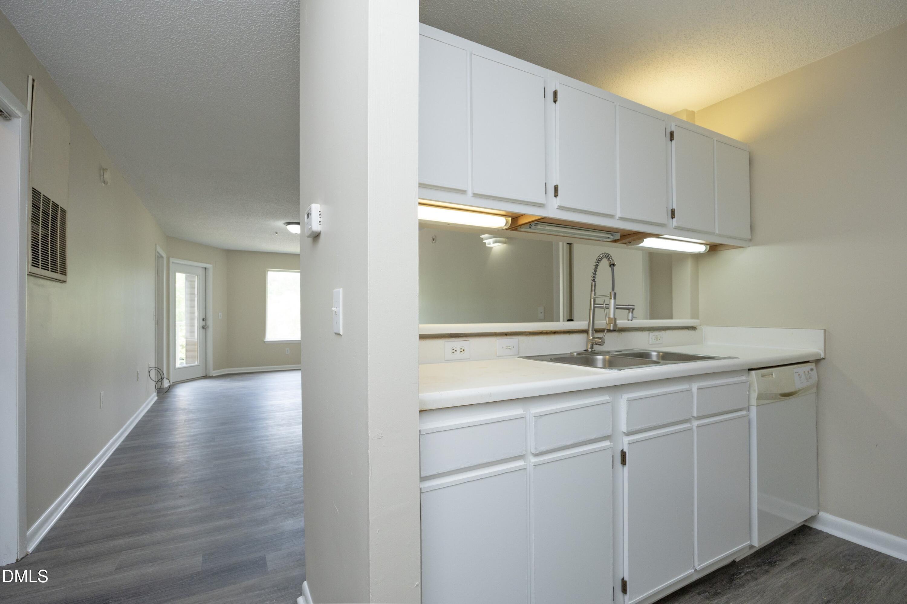 1231 University Court, Unit 104 Raleigh, NC 27606 - Photo 4 of 30 08Kitchen_Living