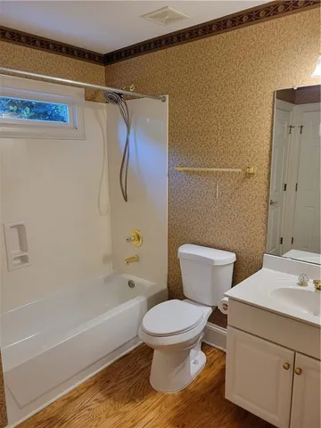 a view of a chairs and table in the patio