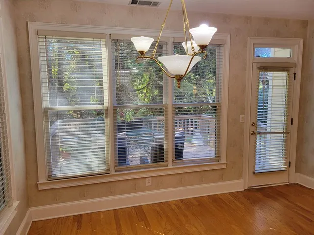 a view of a room that has a window